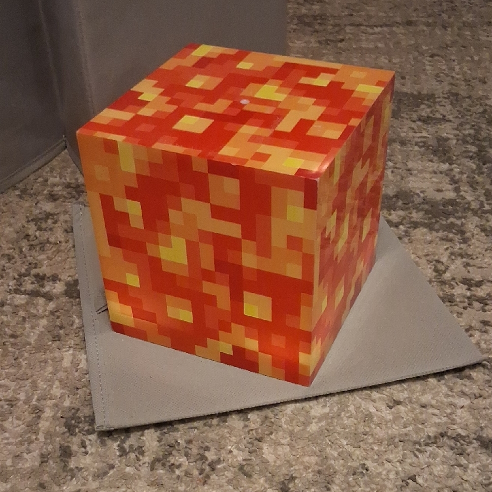 Pixelated Orange and Yellow Toy Block